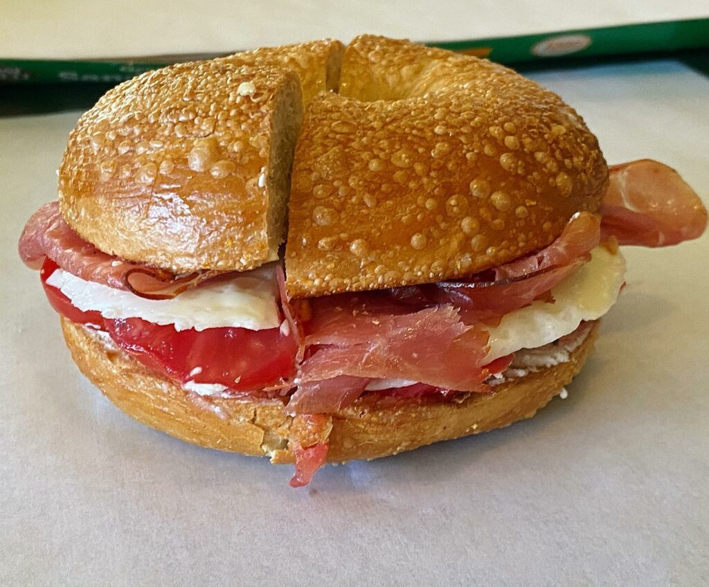 Egg bagel with prosciutto.