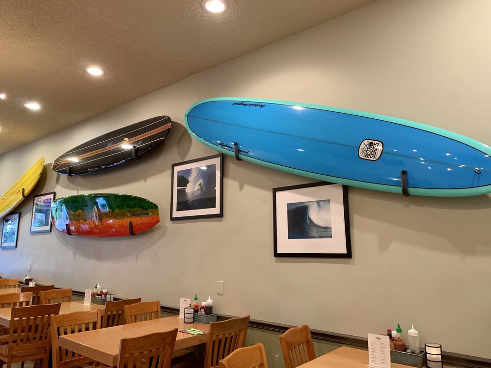 Colorful surfboards on the walls of the board room.