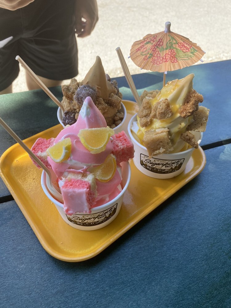 Tropic Thunder, Nutter Buddy, and Barbie's Lemonade Stand sundaes on a dark yellow tray.