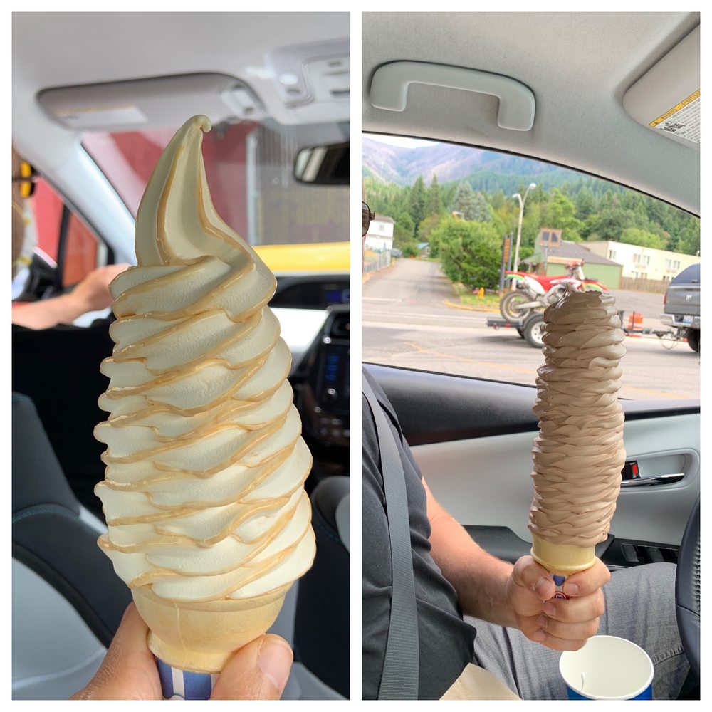 A small ice cream (the ice cream looks to be about 7 inches tall) compared to a large ice cream (this ice cream is a foot tall, or maybe even a foot and a few inches tall).