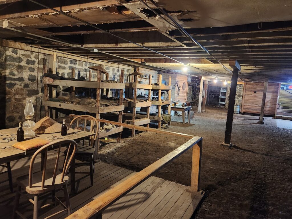 Rows of old bunk beds on the under ground tour.
