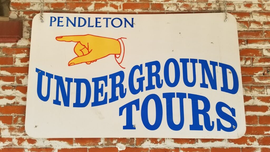 An underground tour sign.