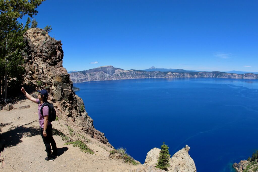 A hiker takes a selfie on the Garfield Peak Trail.