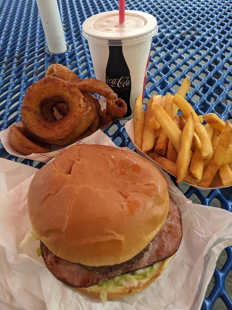 Burger, fries and onion rings