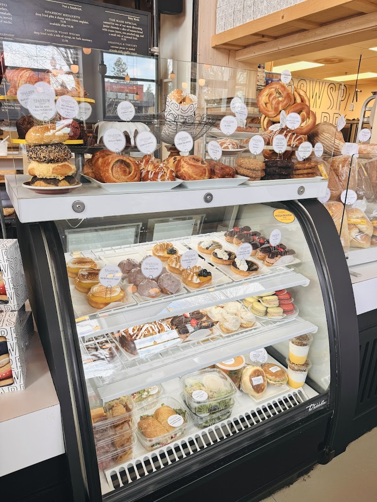 Delicious baked goods inside a glass display. They're so pretty!