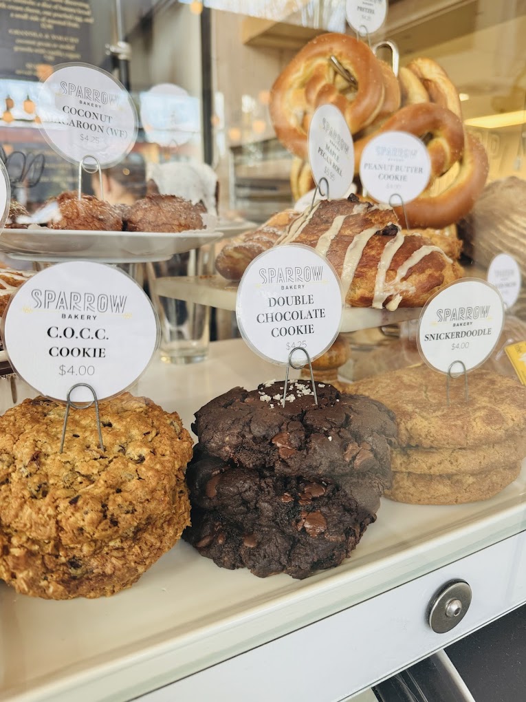 Delicious baked goods inside a glass display. They're so pretty!