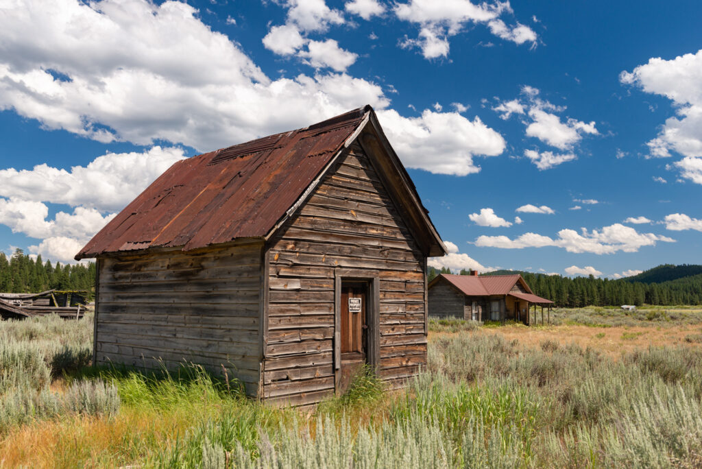 An old wooden shack in the ghost town of Whitney, Oregon.