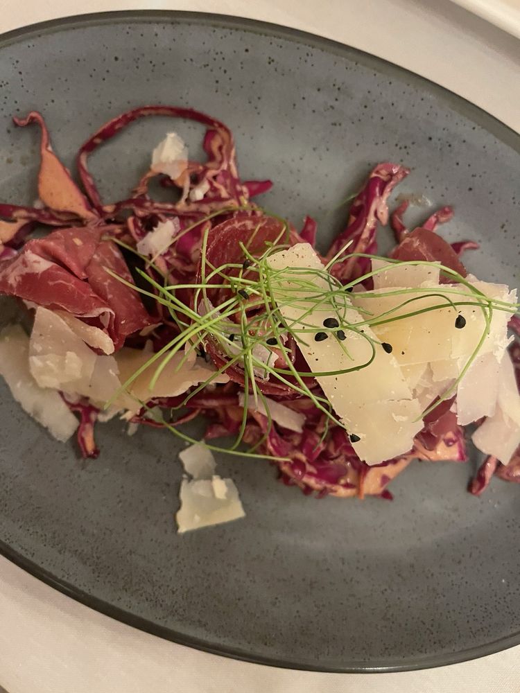 Beef bresaola stuffed with sautéed mushrooms.