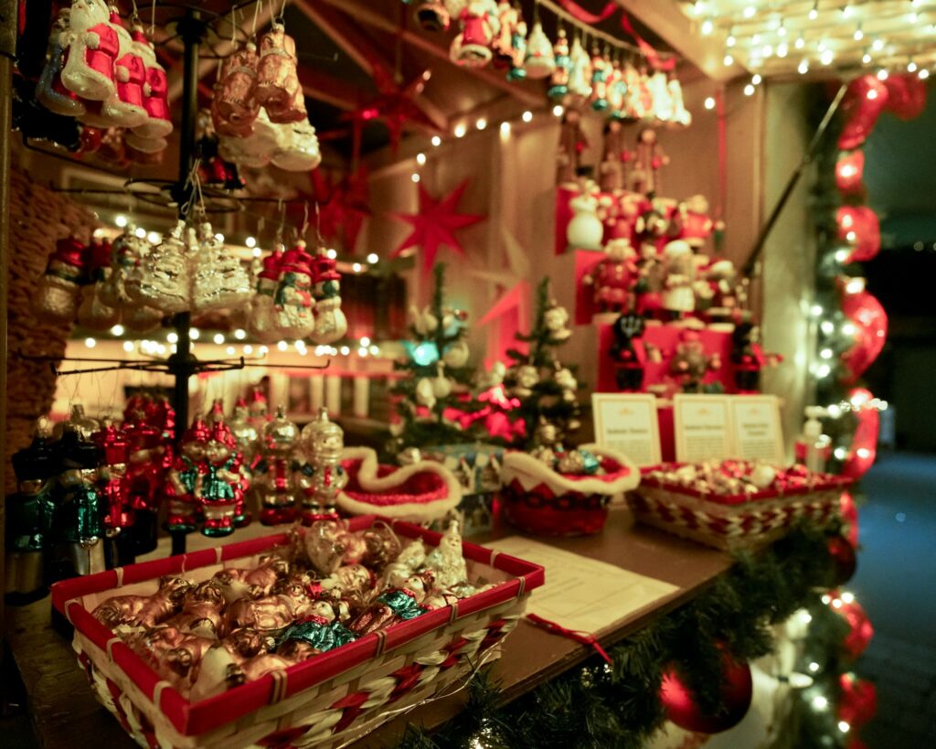 Beautiful glass Christmas ornaments on sale at a vendor booth.