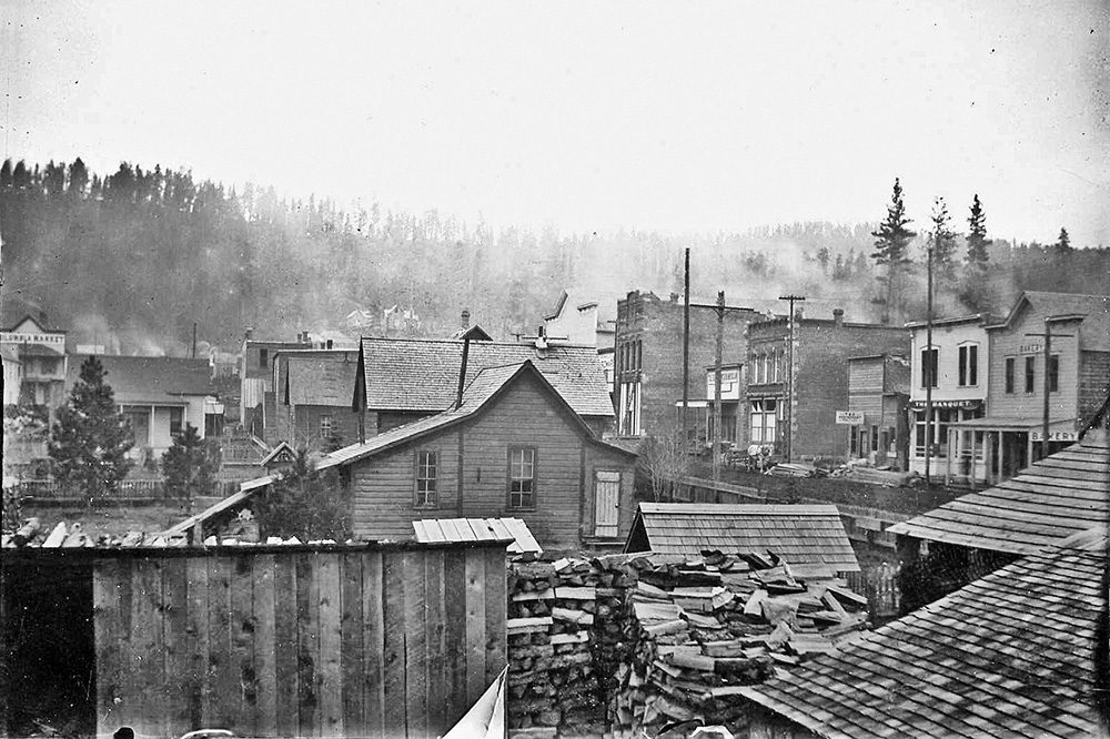 An old black and white photo of Sumpter, Oregon in it's heyday.