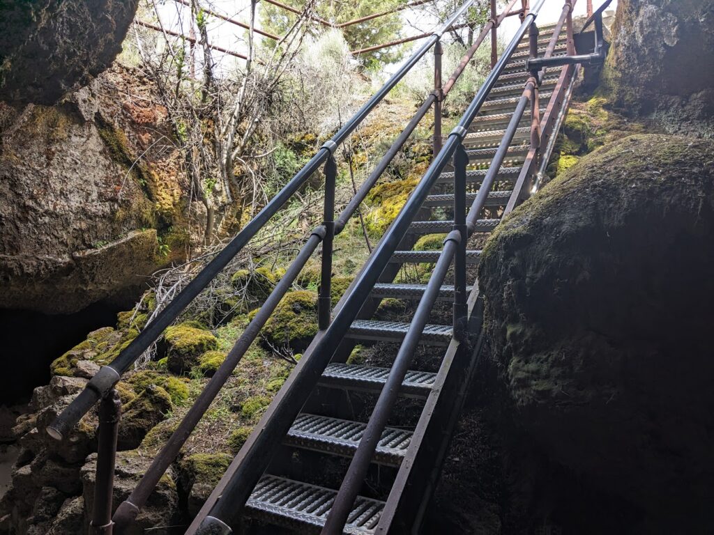 A metal ladder leading out of a cave at the Lava Beds.