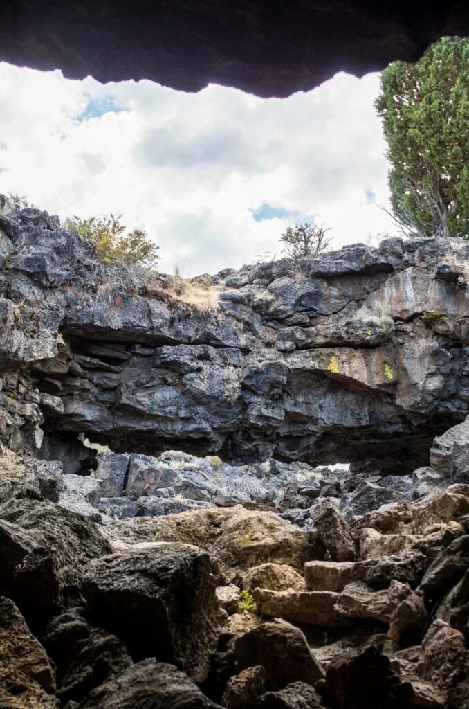 Looking down into a cave at the Lava Beds National Monument.