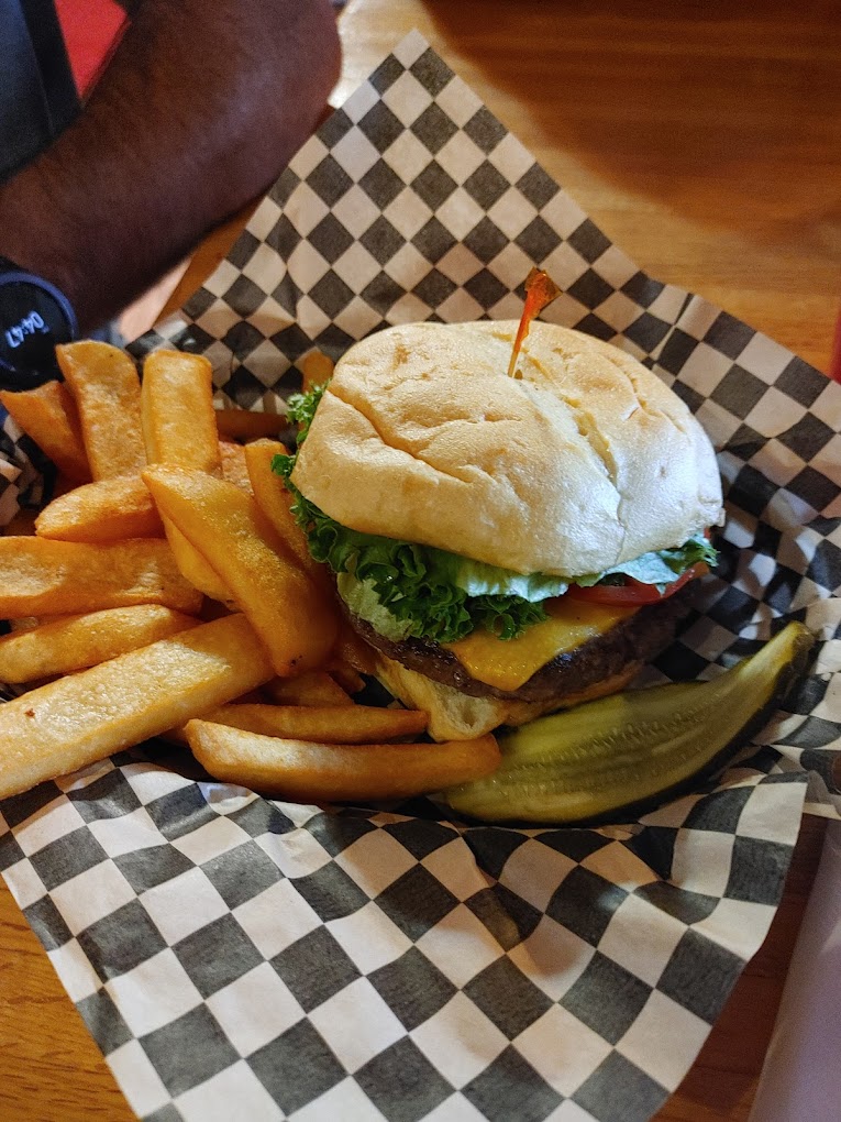 A delicious looking burger and fries at Austin House.