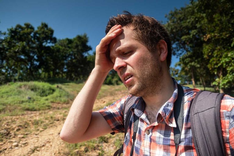 “Go On Without Me,” Says Hiker Who Dramatically Sits on Rock, Three Minutes Into Hike
