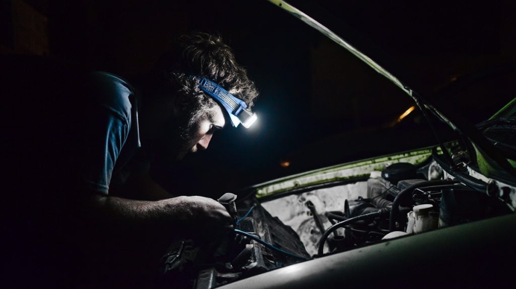 methy guy working on car