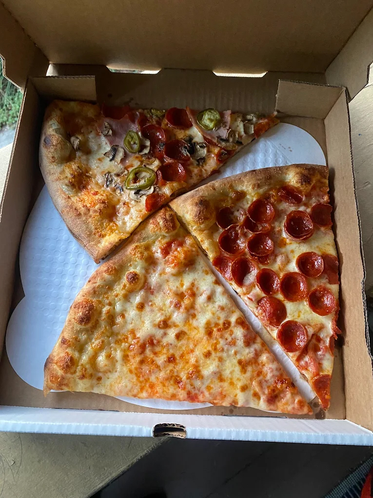 Three slices of delicious looking pizza in a box from Baby Doll Pizza in Portland.