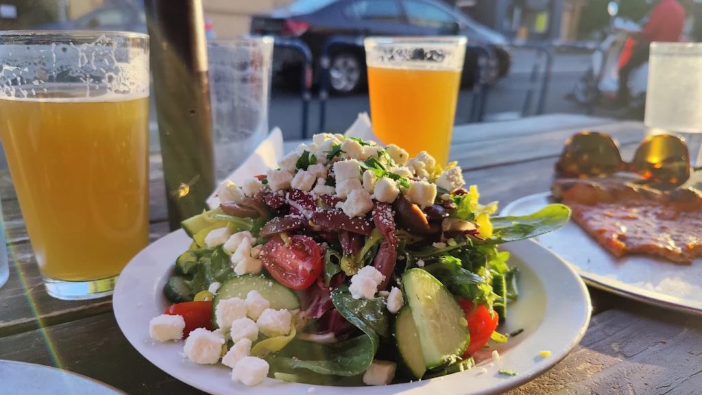 A salad heaped with goodness at Baby Doll Pizza PDX.