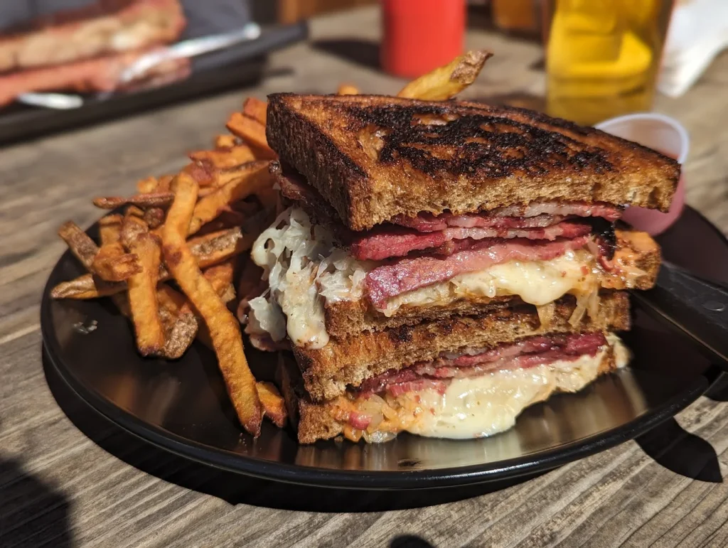 An absolutely delicious looking smoked meat and melted cheese sandwich at The Wilds Tap House.