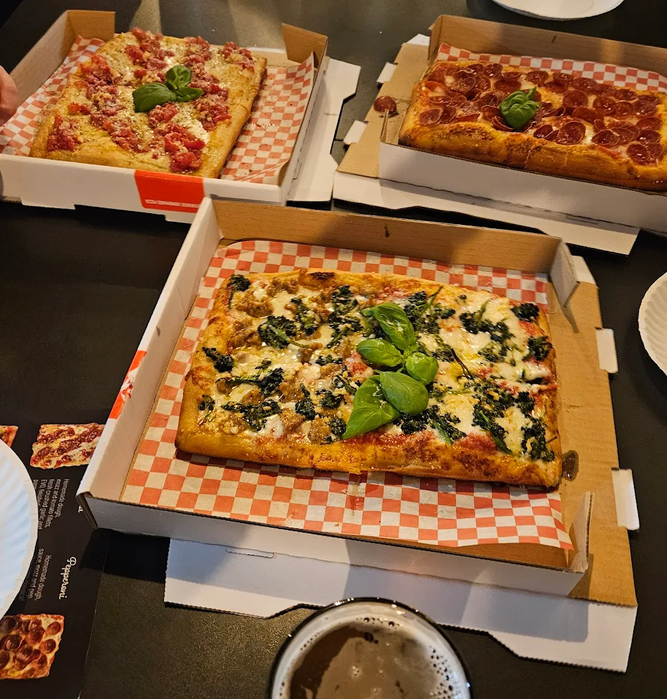 Three delicious looking pizzas at New York Squares in Independence, Oregon.