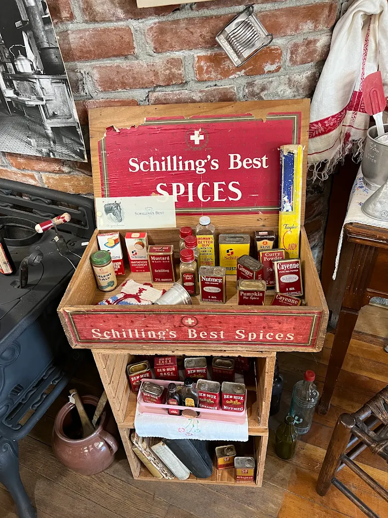 A display showing old spice containers.