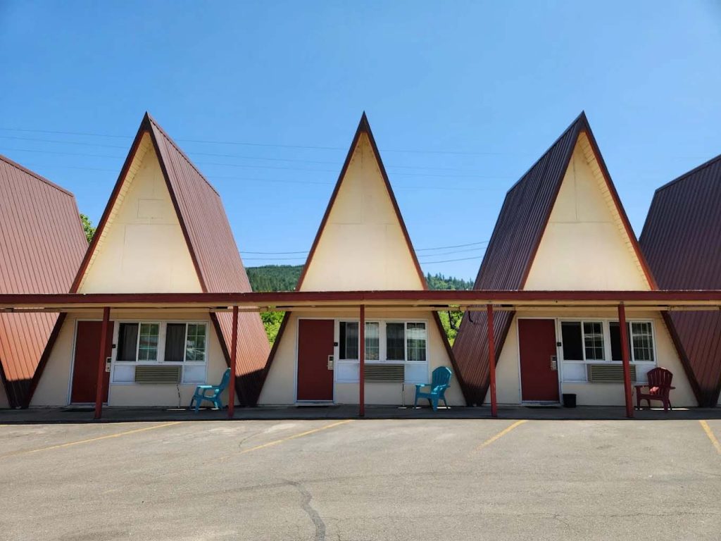 Three A-frame cabins lined up at The Ranch Motel near Oakland, Oregon.