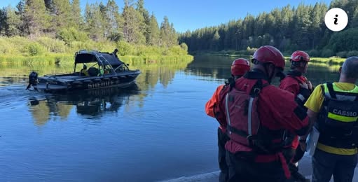 Search and rescue crews look for a missing person in the Deschutes River.