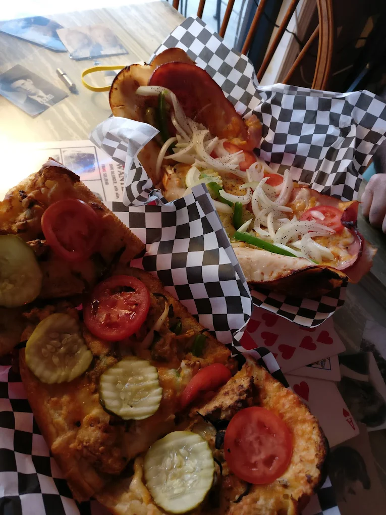 Two delicious looking grinders with meat and veggies at Vinnie's Chicago Sandwich Shop in St. Helens Oregon.