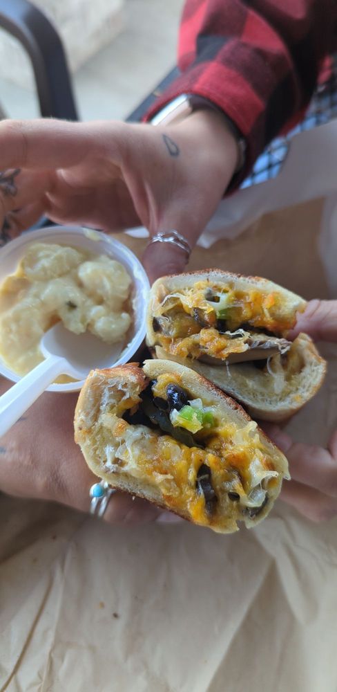 A tasty looking sandwich and potato salad.