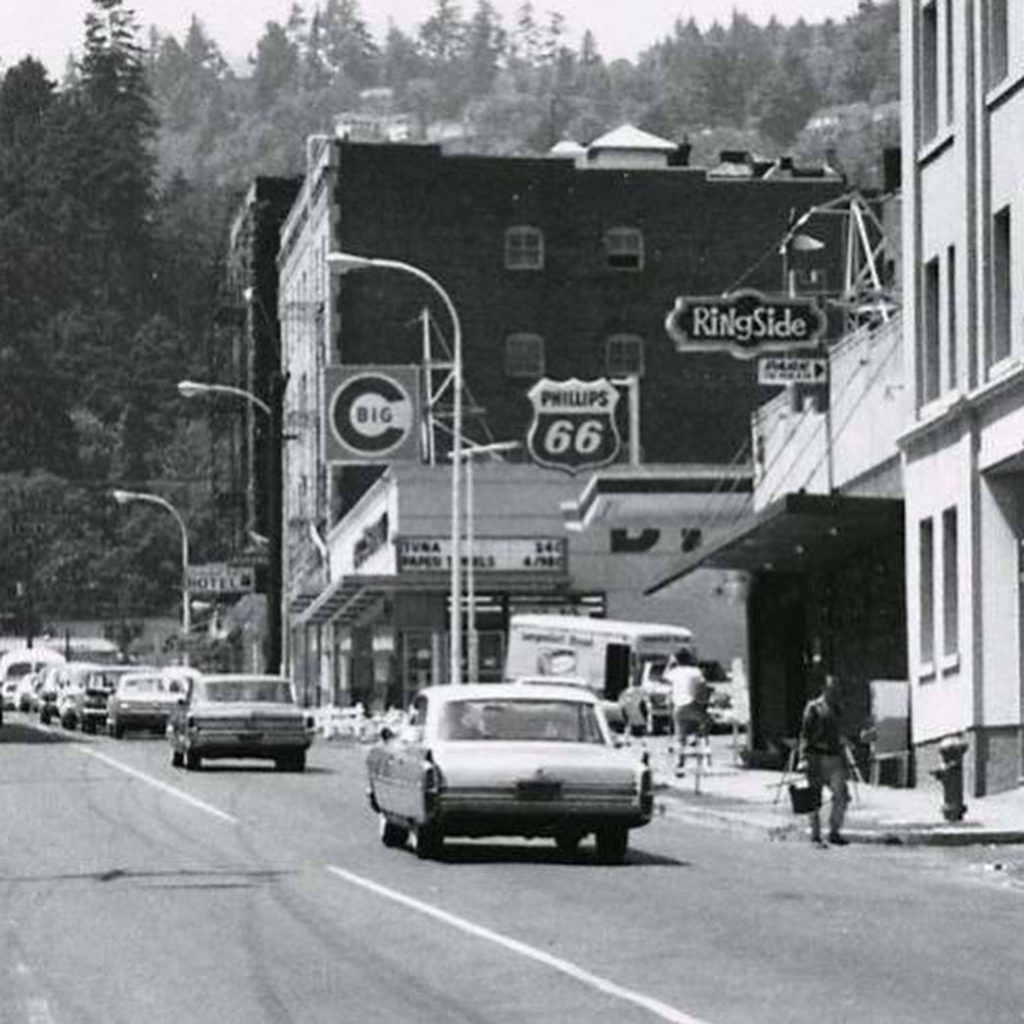 An old black and white photo of the RingSide Steakhouse building.