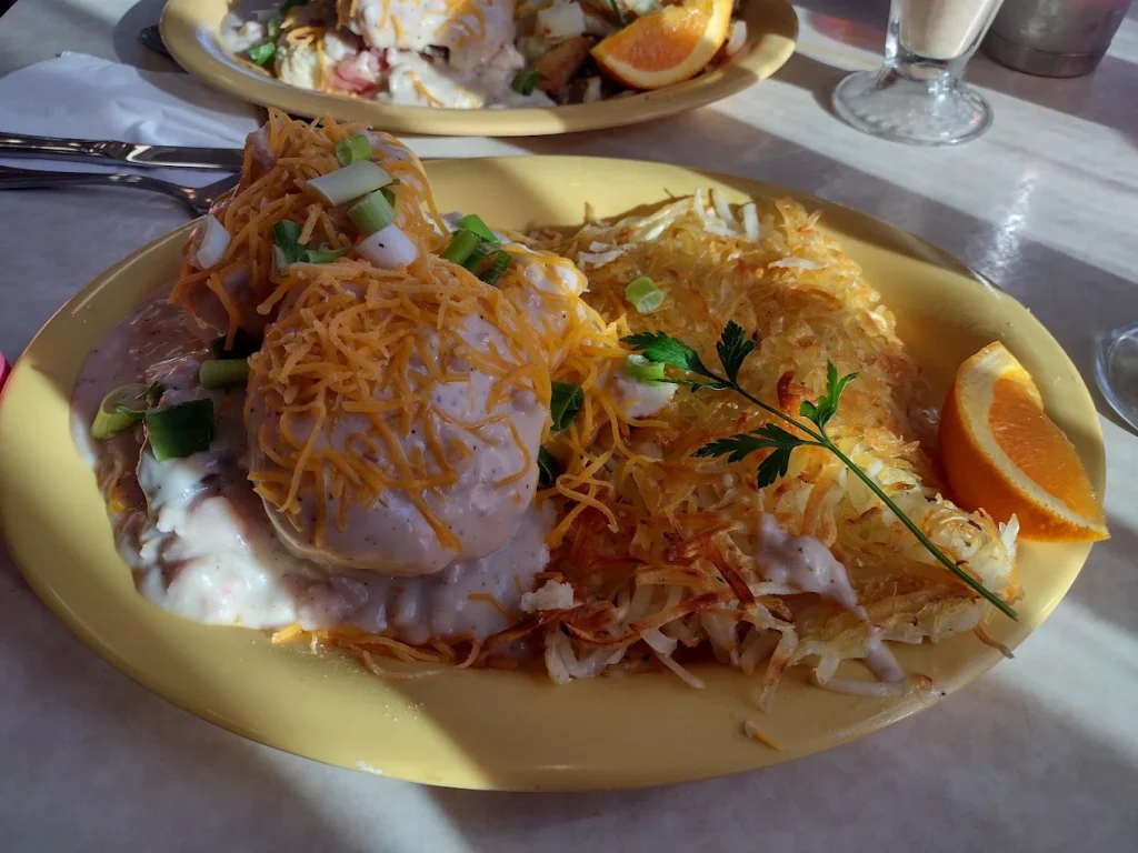 A huge plate of breakfast food.