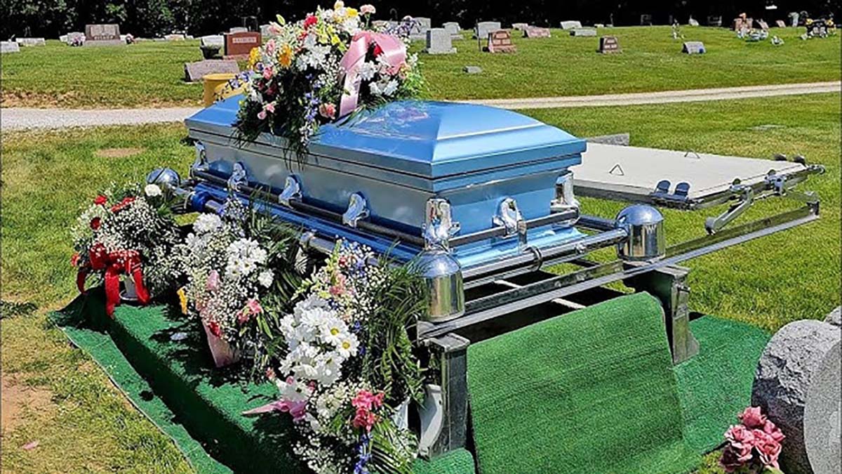 casket being lowered into ground
