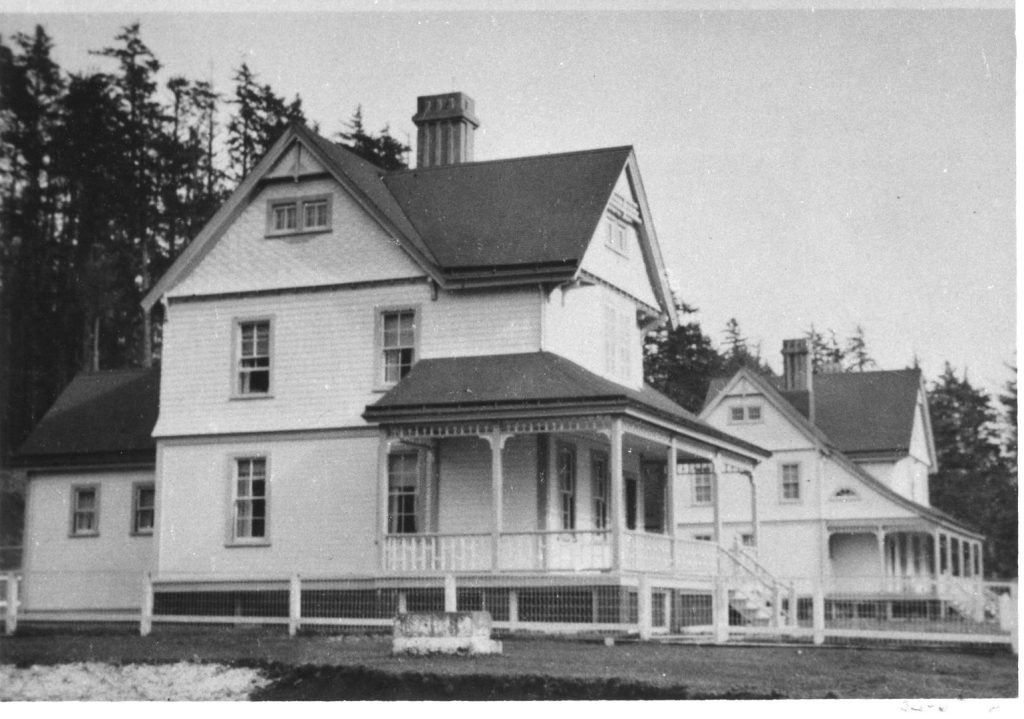 A black and white photo of the two light keeper's cottages.