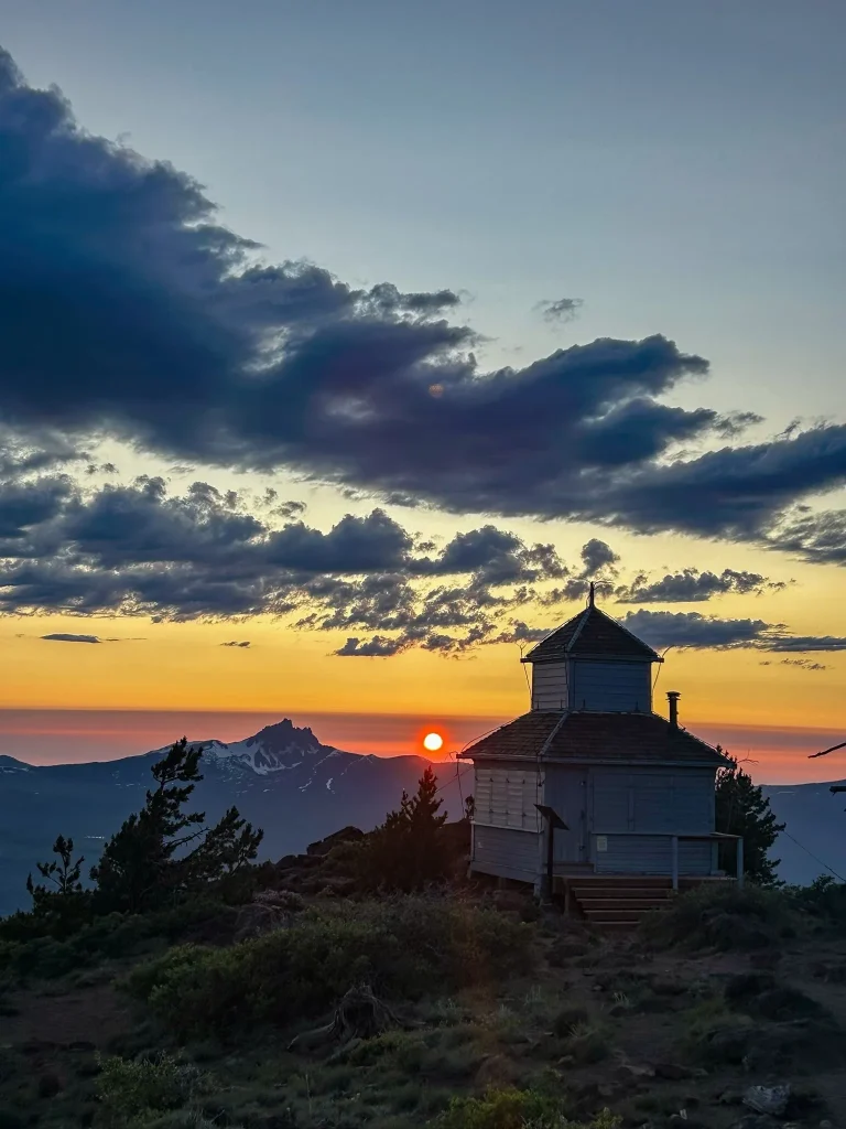The old fire lookout at the top of Black Butte at sunset.