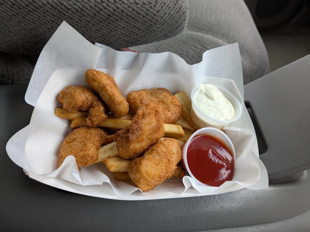 Fresh albacore tuna fish and chips with fries and tartar sauce at Bowpicker in Astoria Oregon