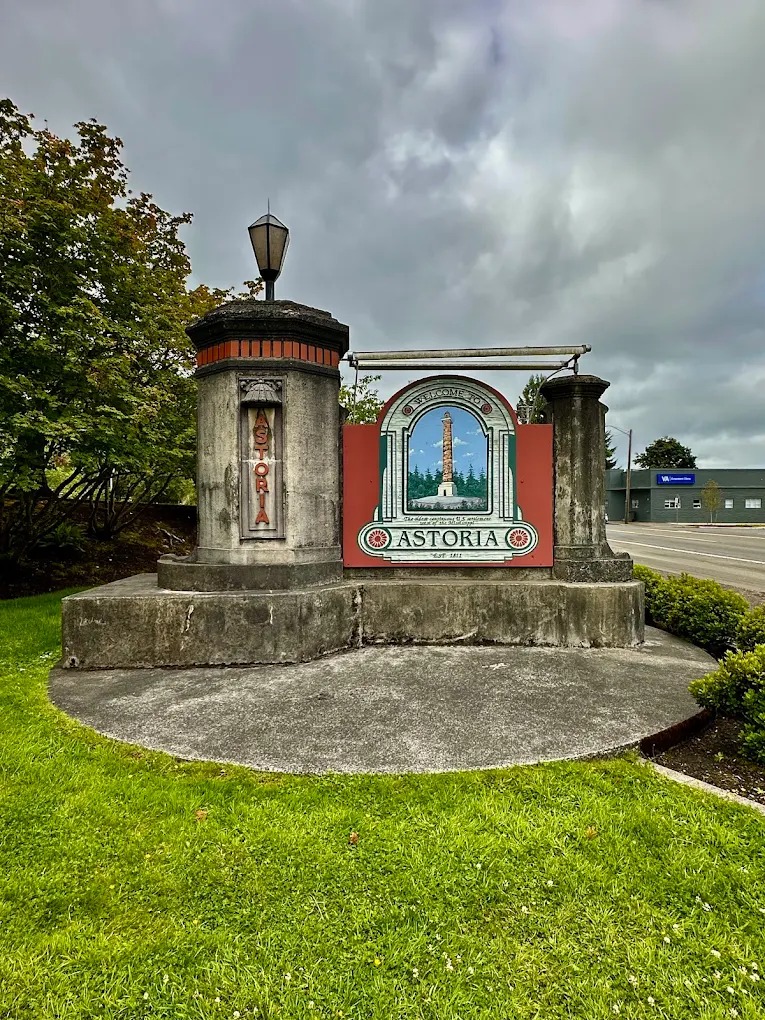 Welcome to Astoria Oregon sign near entrance to historic coastal town on the Columbia River