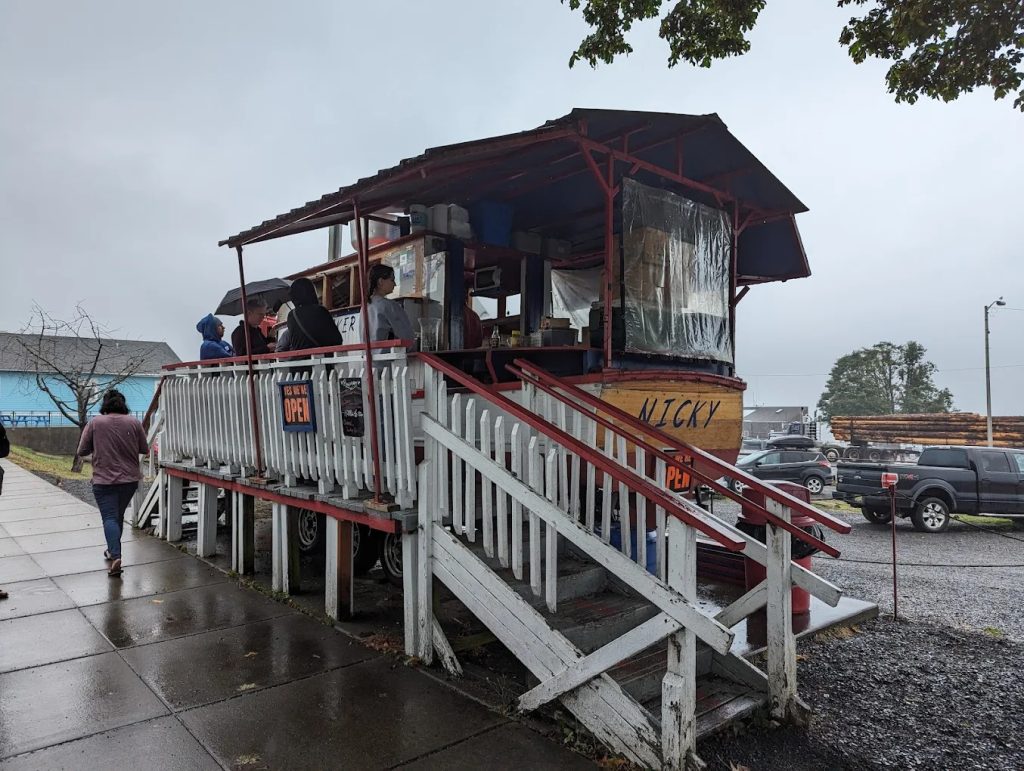 Customers lined up at the Bowpicker boat ordering fish and chips in Astoria Oregon