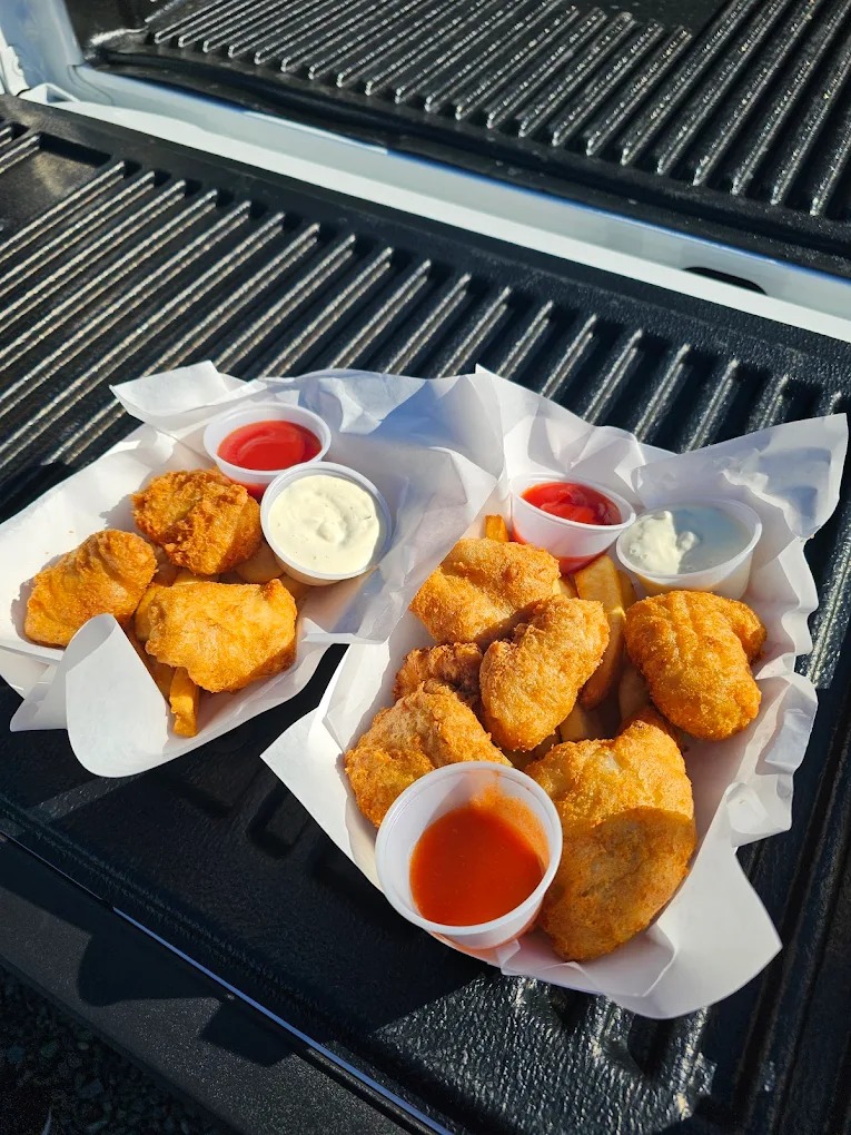 Fresh albacore tuna fish and chips with fries and tartar sauce at Bowpicker in Astoria Oregon