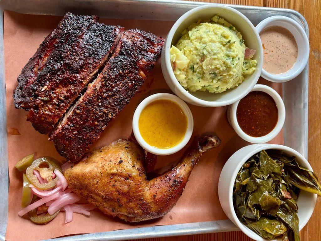 Texas-style brisket and smoked meats at Podnah’s BBQ in Portland Oregon, wood-fired barbecue restaurant interior and classic Southern sides