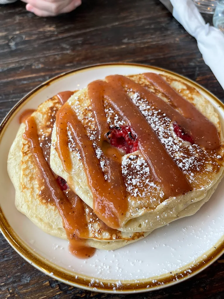 Delicious looking pancakes drizzled with sauce at Broder Strand Cafe in Astoria, Oregon.