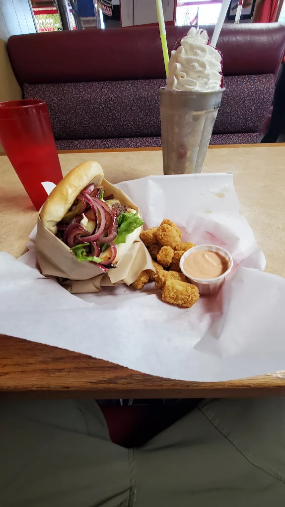 An old fashioned milkshake, burger and tots.