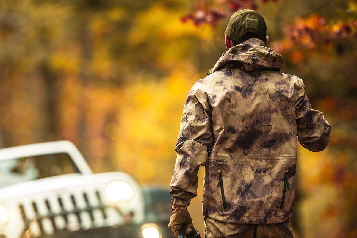 Hunter,Wearing,Camouflage.,Fall,Hunting,Season Hunter Wearing Camouflage. Fall Hunting Season