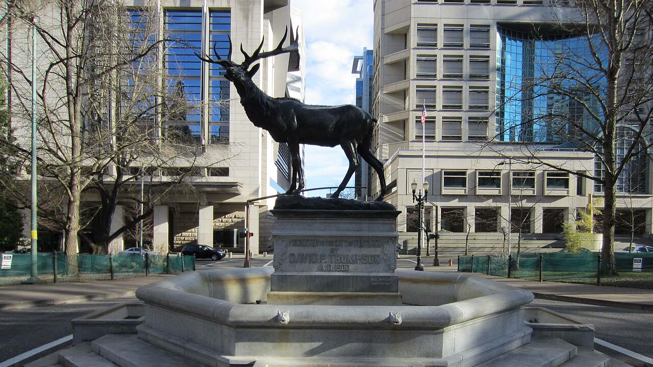 Thompson_Elk,_Plaza_Block,_Portland,_OR-CROP Thompson Elk Fountain, Portland Oregon, 2020 Riots, Graffiti, Statue Removed, Reinstallation Date, April 2026, Satire, Historical Momunment, Humor