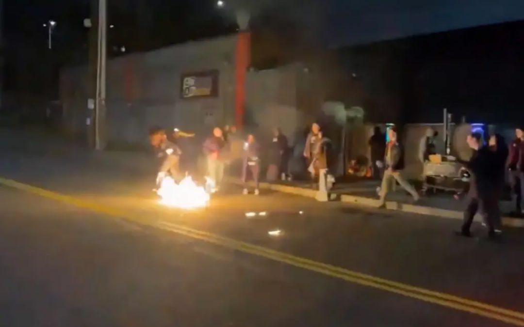 Anti-ICE Protester Catches Fire While Attempting To Burn American Flag In Portland