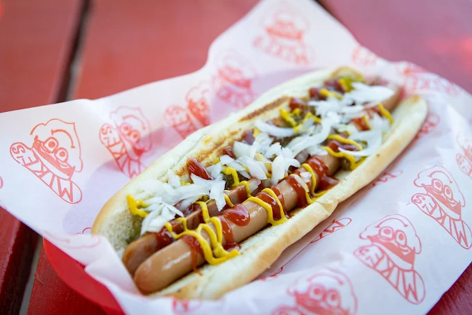 Classic hot dog with mustard ketchup and onions at Mike’s Drive-In Oregon drive-in food