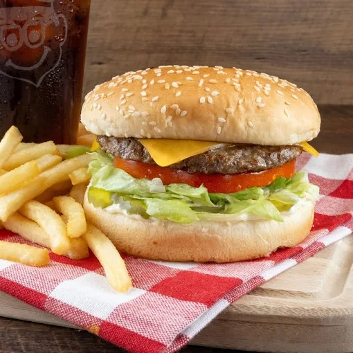 Cheeseburger and melted cheese with fries at Mike’s Drive-In Oregon burger joint
