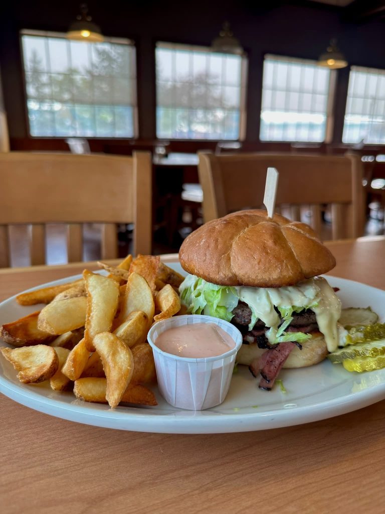 Pastrami burger with potato wedges