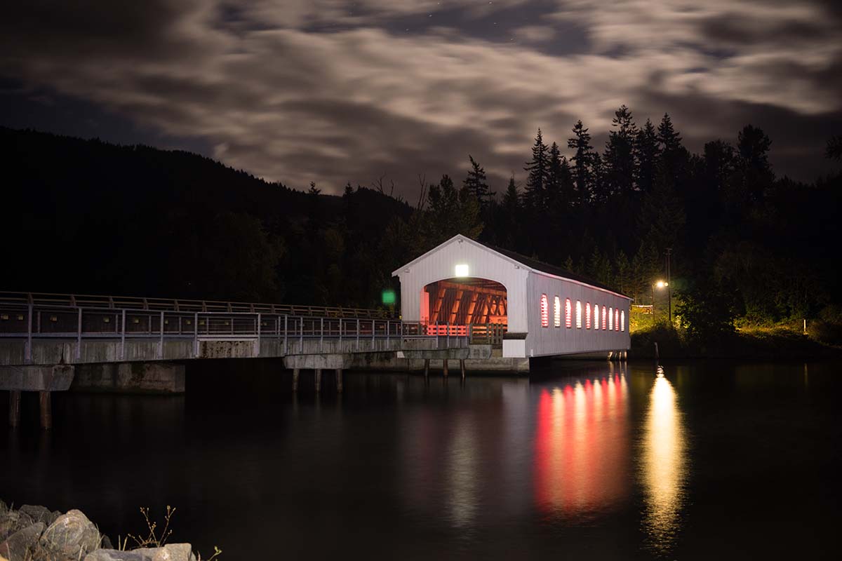 Lights,Glow,And,Reflect,In,The,Water,Night,Scene,Lowell