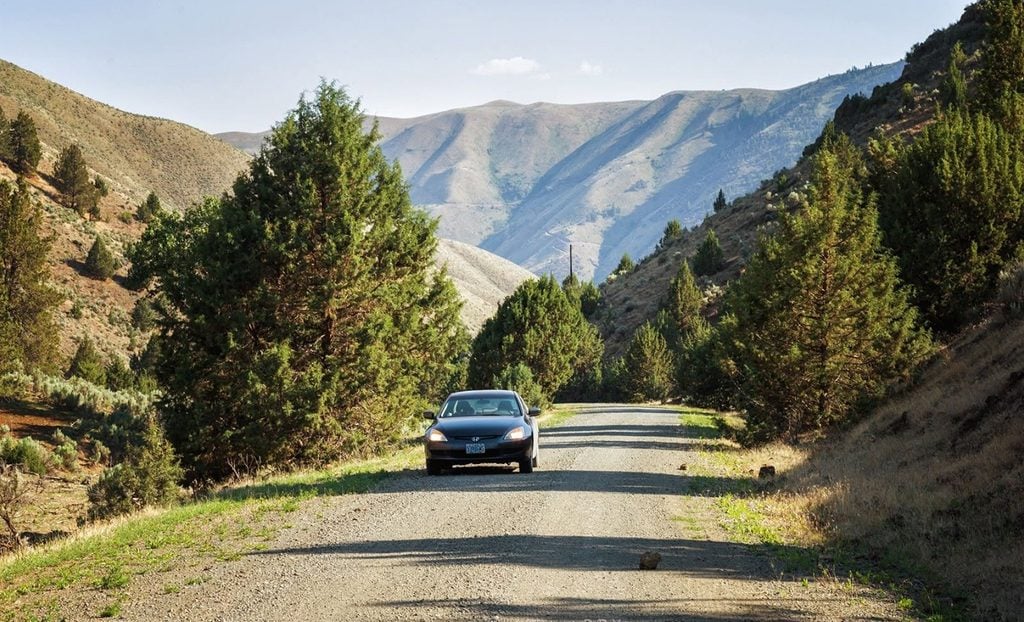 The Two-Finger Wave, Rural Oregon, Courtesy, Steering Wheel Wave, Back Roads, Look Like a Local, Unspoken Rule, Driving Tips