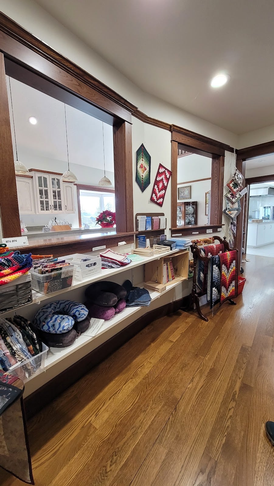 Textiles and other handmade goods in Country Bakery’s gift area.