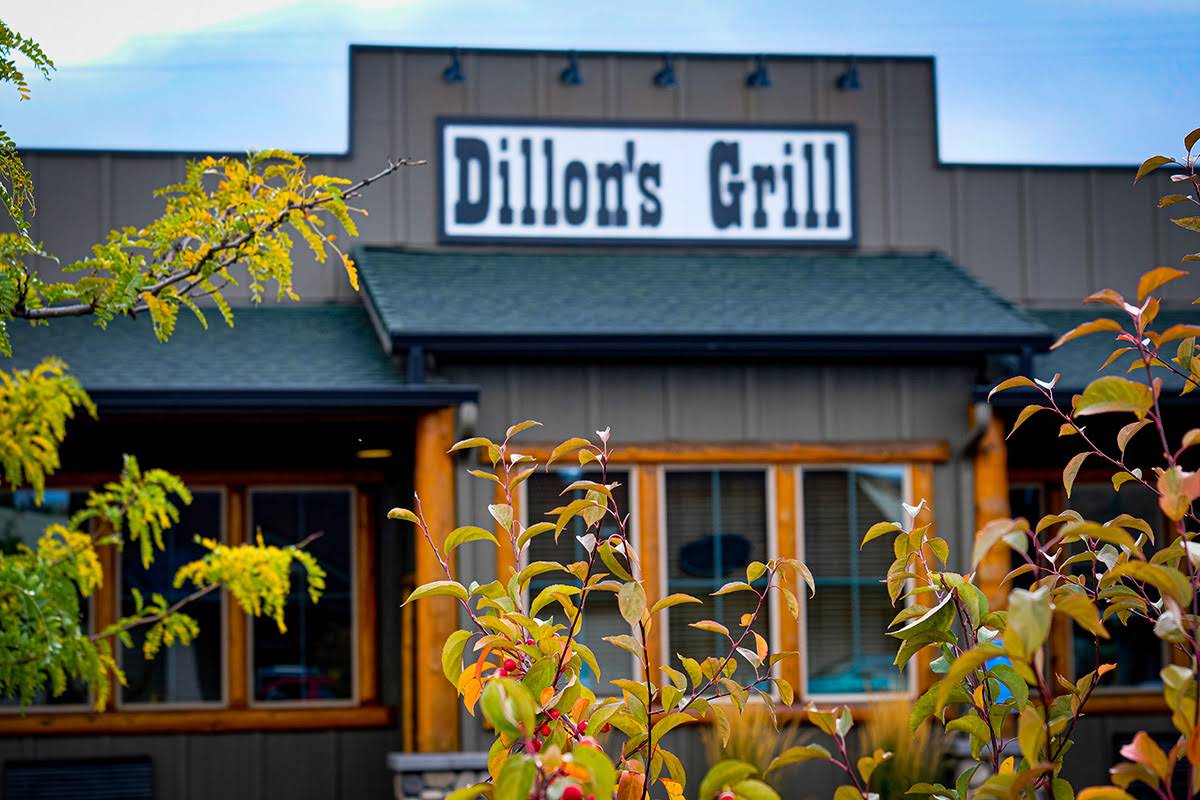 dillons-grill-prineville-exterior Dillon's Grill sign and restaurant exterior framed by autumn foliage in Prineville, Oregon